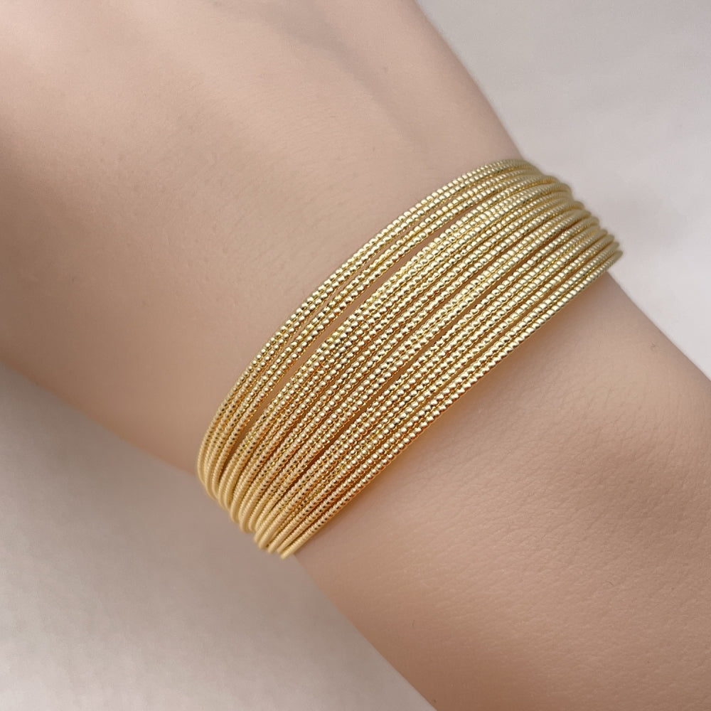 Oro Laminado Individual Bangle, Gold Filled Style Polished, Golden Finish