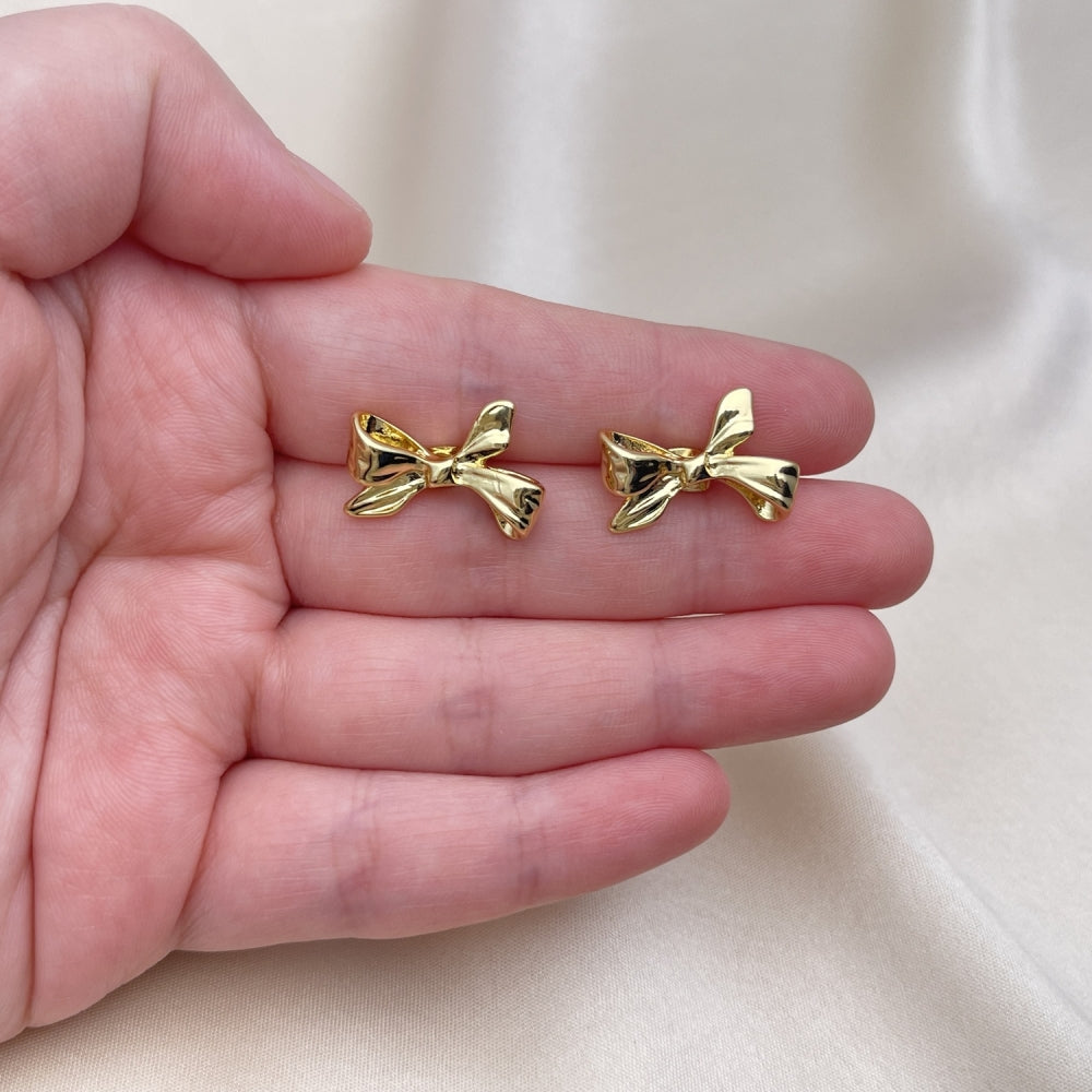 Oro Laminado Stud Earring, Gold Filled Style Bow Design, Polished, Golden Finish