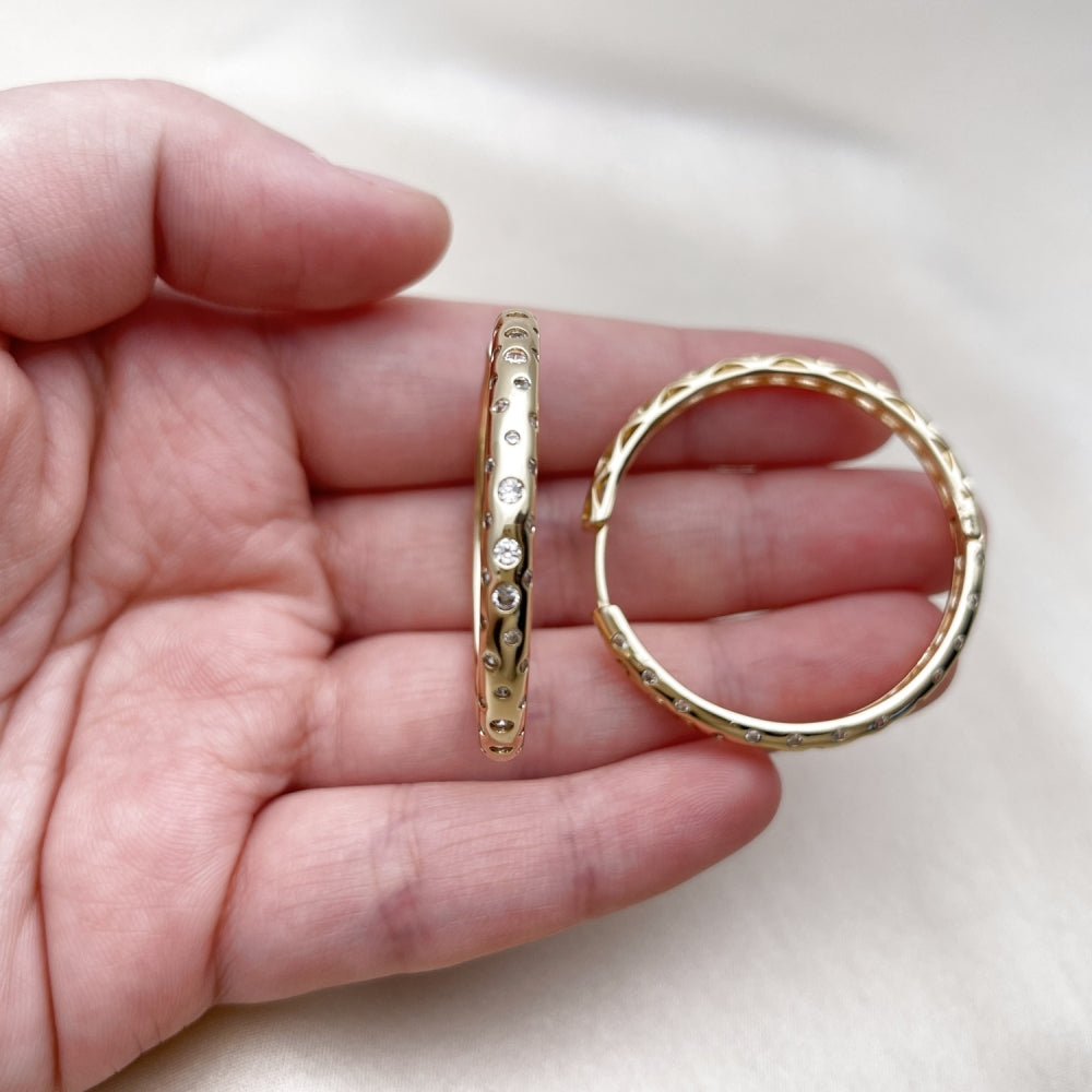 Oro Laminado Huggie Hoop, Gold Filled Style with White Cubic Zirconia, Polished, Golden Finish