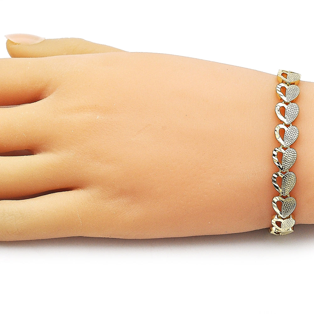 Oro Laminado Solid Bracelet, Gold Filled Style Heart Design, Diamond Cutting Finish, Golden Finish
