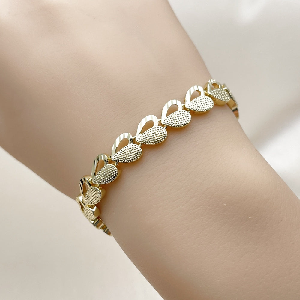 Oro Laminado Solid Bracelet, Gold Filled Style Heart Design, Diamond Cutting Finish, Golden Finish