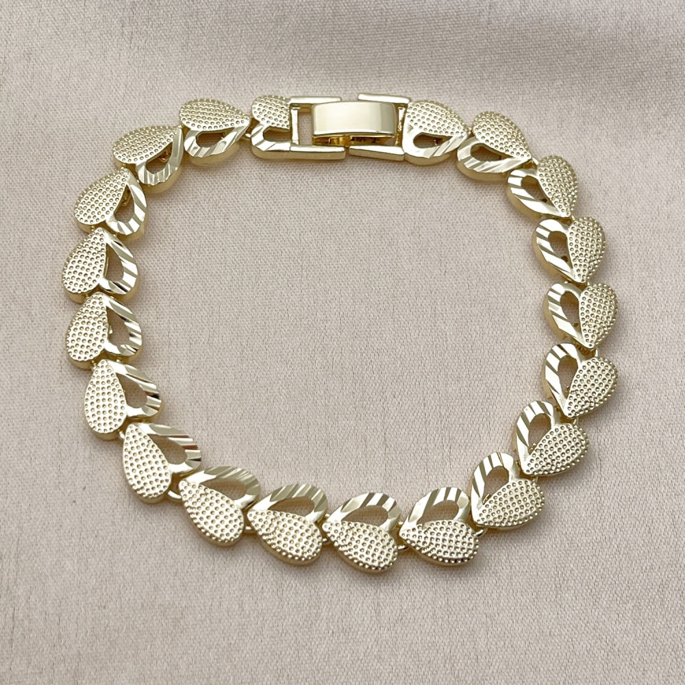 Oro Laminado Solid Bracelet, Gold Filled Style Heart Design, Diamond Cutting Finish, Golden Finish