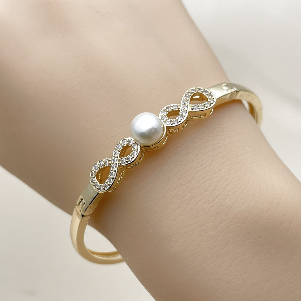 Oro Laminado Individual Bangle, Gold Filled Style Infinite and Ball Design, with White Cubic Zirconia and Ivory Pearl, Polished, Golden Finish