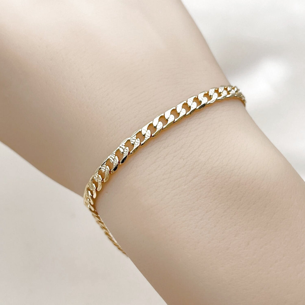Oro Laminado Basic Bracelet, Gold Filled Style Curb Design, Diamond Cutting Finish, Golden Finish