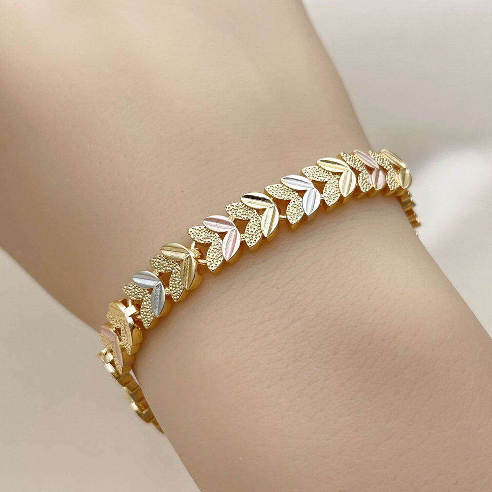 Oro Laminado Solid Bracelet, Gold Filled Style Leaf Design, Diamond Cutting Finish, Tricolor