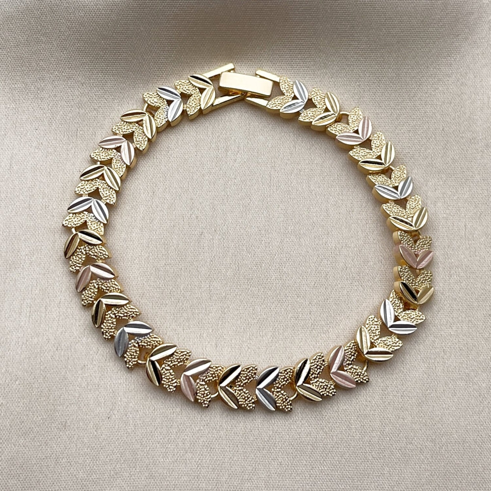 Oro Laminado Solid Bracelet, Gold Filled Style Leaf Design, Diamond Cutting Finish, Tricolor